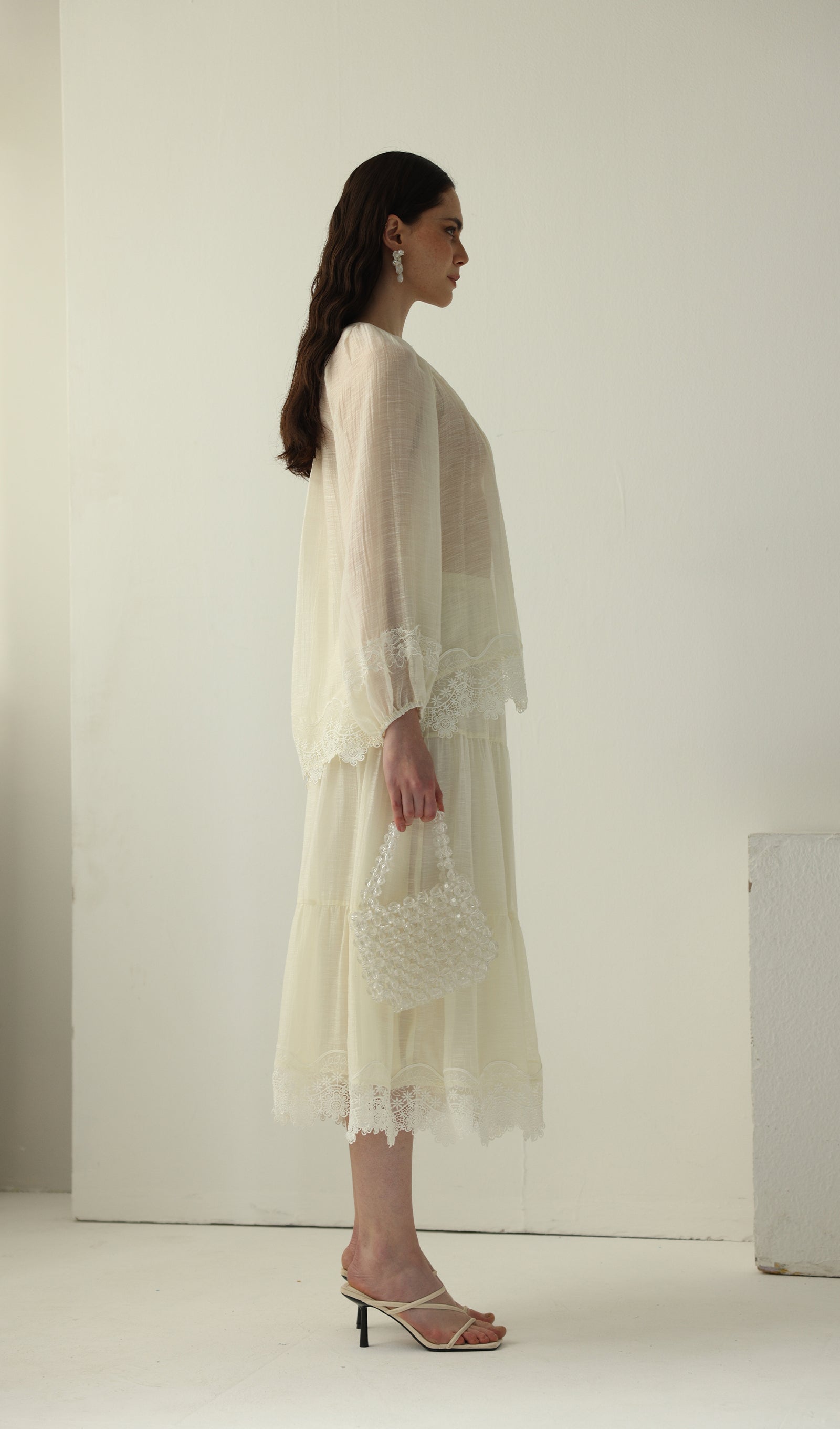 بلوزة محبوكة بأكمام طويلة 