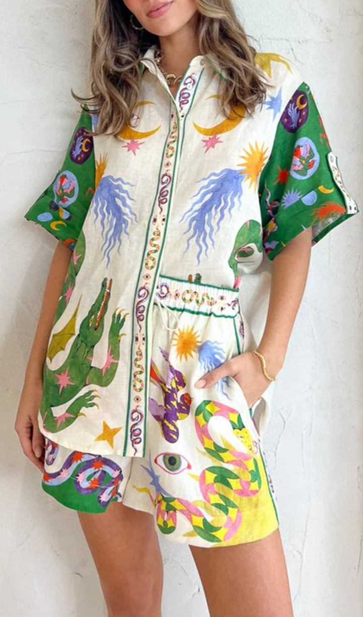 The floral short sleeved crocodile cartoon printed shirt set is a perfect fusion of elegance and charm. This shirt set is made of delicate cotton and linen fabric, adorned with exquisite crocodile cartoon patterns, exuding feminine and elegant qualities. Its short sleeved design and short silhouette create an eternal silhouette, making it perfect for leisure outings and vacations