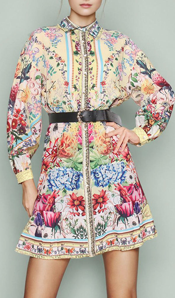 Unleash your inner flower child with the Queena-wish Floral Lapel Mini Dress With Belt. This playful dress features a colorful floral print that will make you stand out in any crowd. 