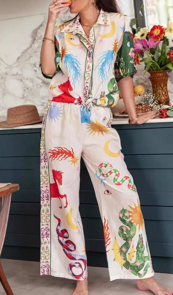 Printed short sleeved long pants shirt set combines elegance and charm, exuding a feminine elegance that is perfect for leisure and vacation.