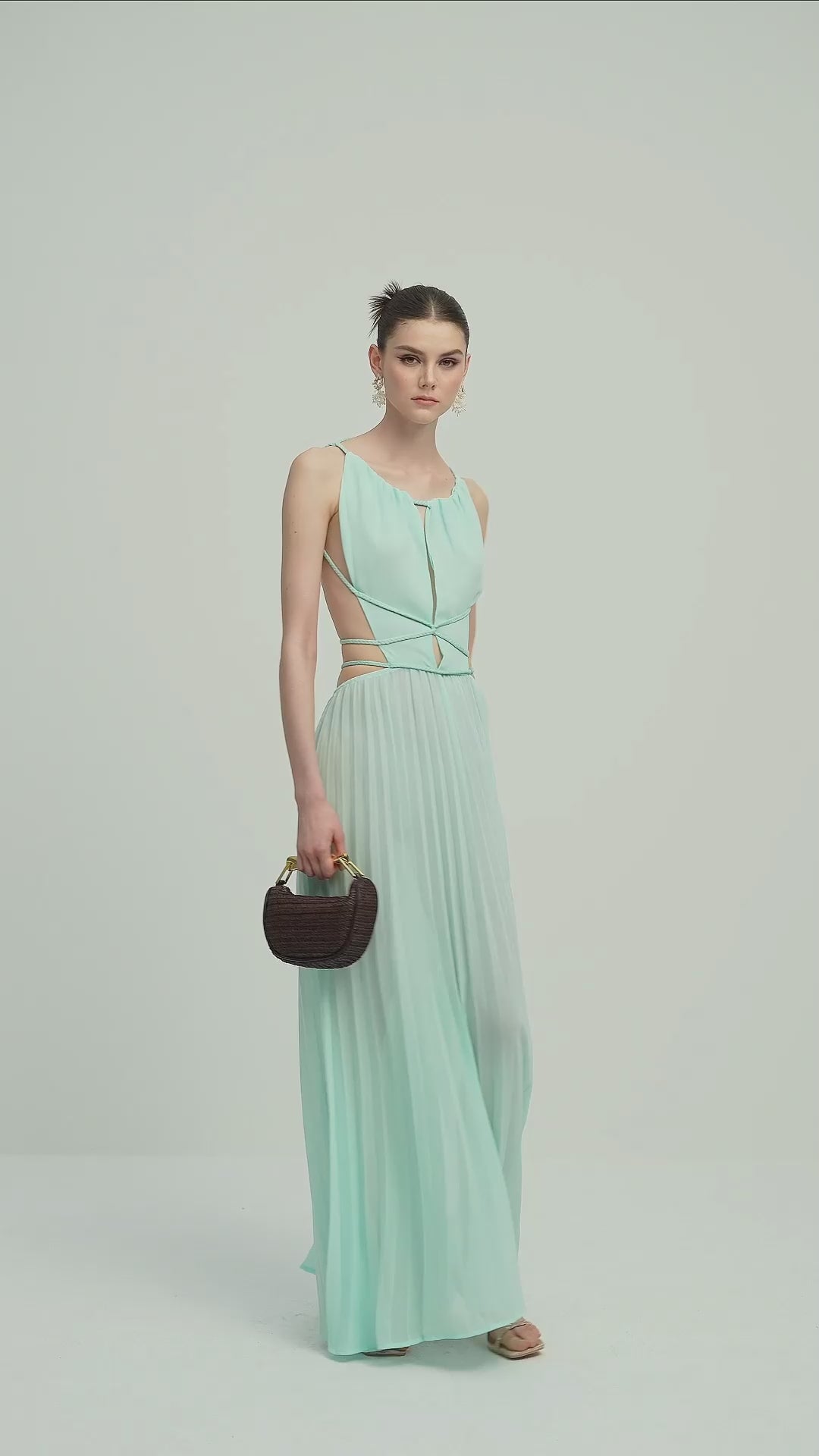 Load video: Solid Halter Open Back Maxi Dress