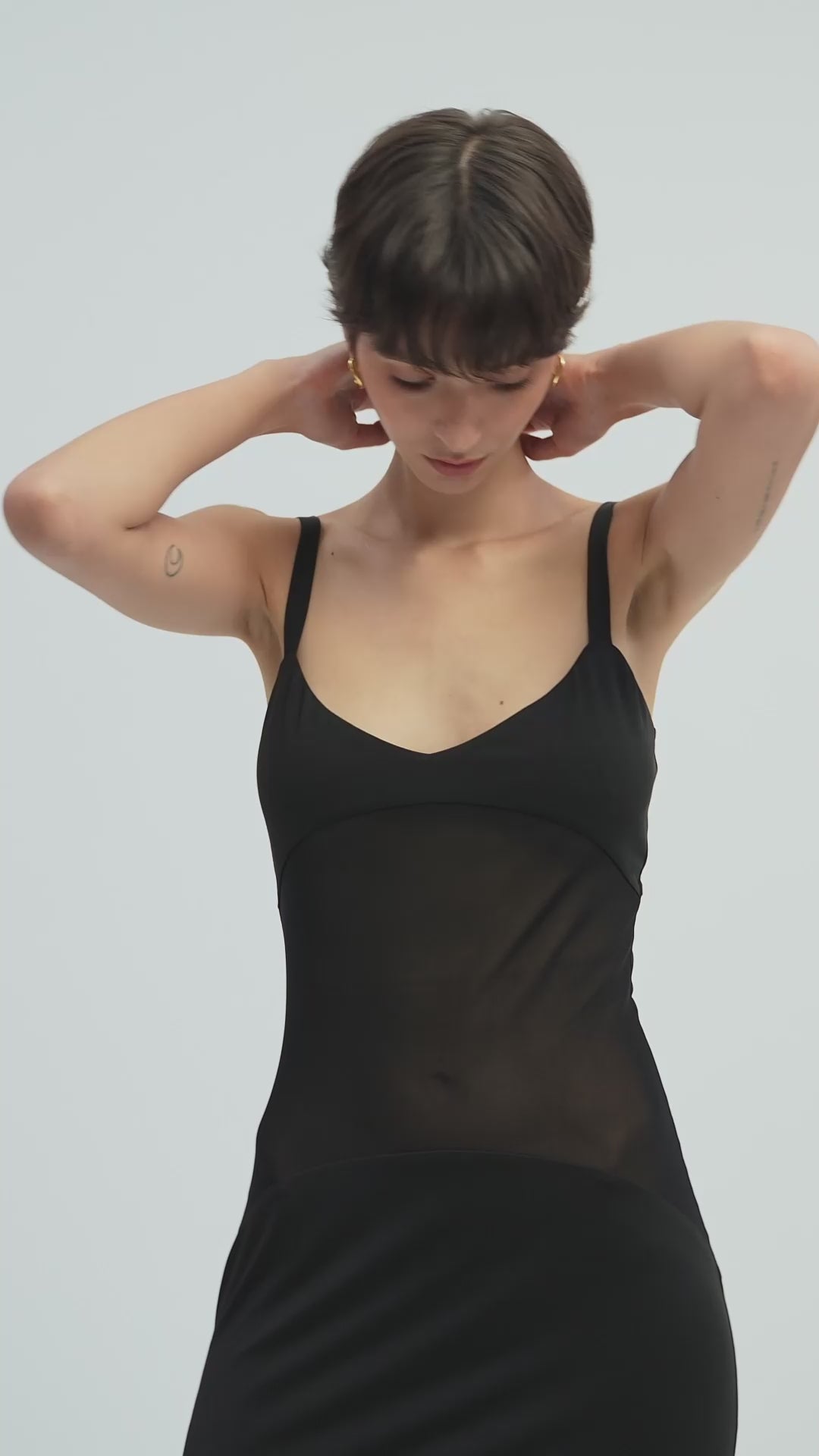 Load video: Solid Sheer Knit Curve Maxi Dress In Black