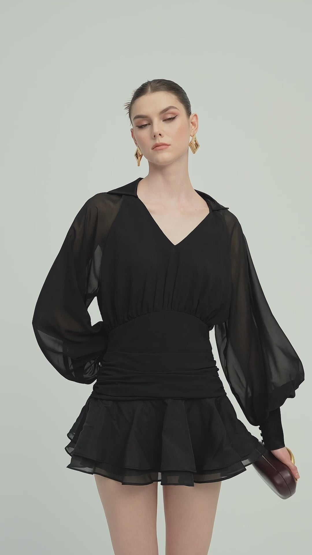 Load video: Solid Lantern Sleeve Mini Dress In Black